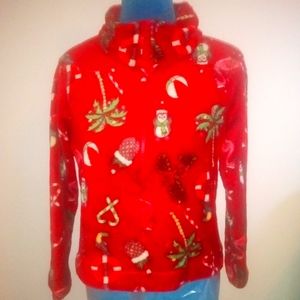 Red fleece Christmas sweater with a zipper use in good condition size 14 girls